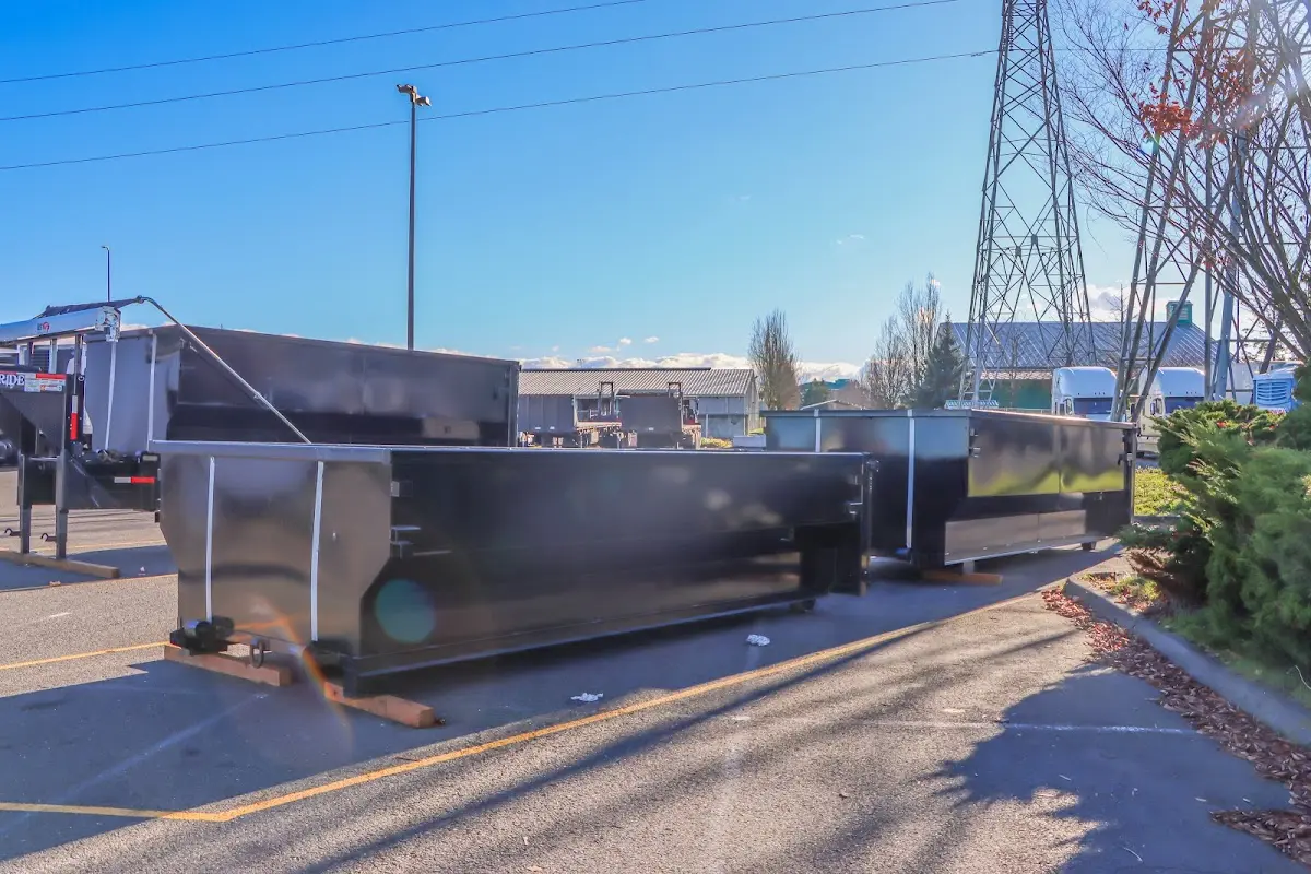 Roll-off dumpster ready for waste disposal at job site for 12 Yard Dumpster Rental in Midway